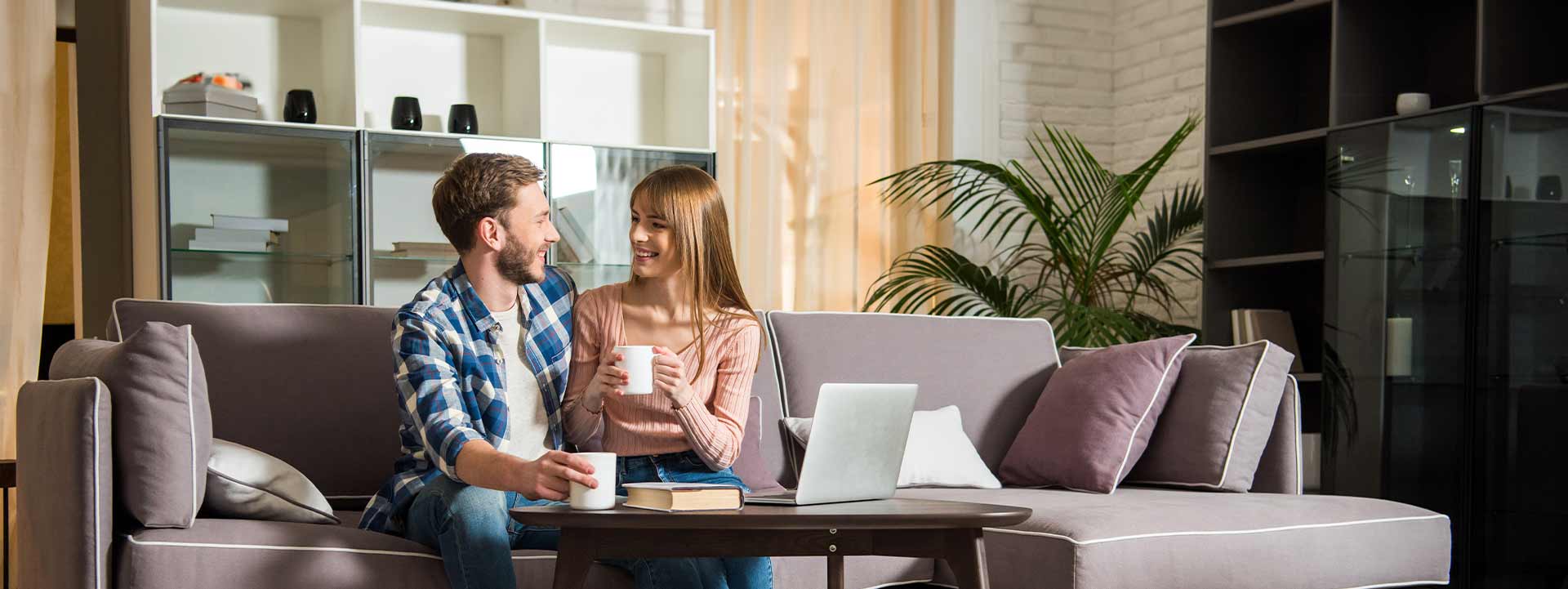 happy couple on couch