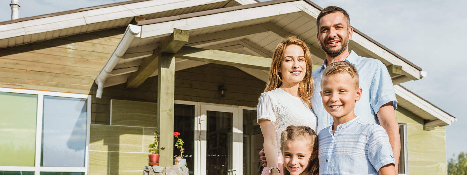 happy family outside home