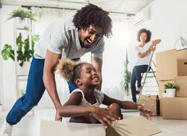 Happy Family moving into home