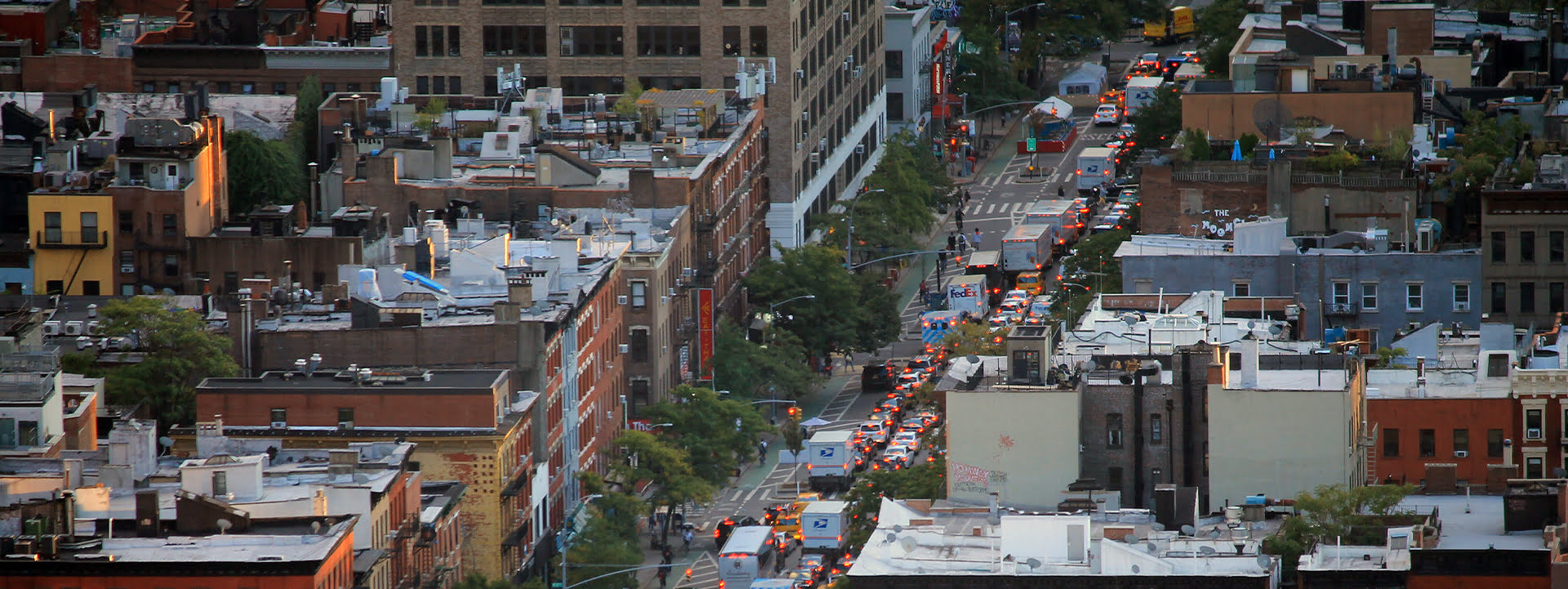 Ariel view of traffic in Hell's Kitchen, NY during sunset